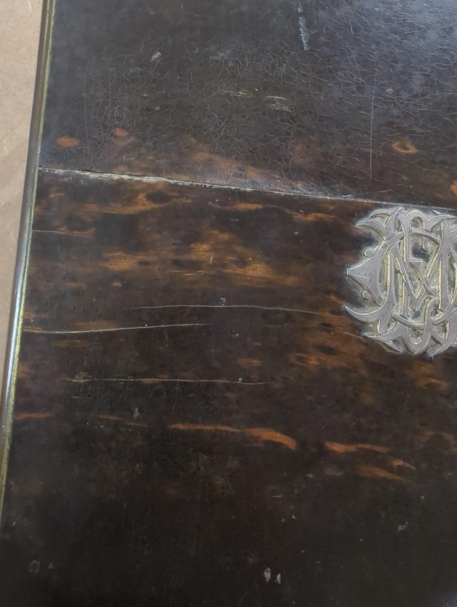 A late Victorian Mappin & Webb coromandel wood toilet box, containing ten silver mounted toilet jars, George Betjemann & Sons, London, 1895, box 21.2cm, mechanism for drawer a.f.